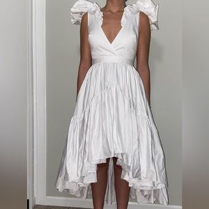 Stunning white Dress with pockets. It's quite heavy, and made to perfection.